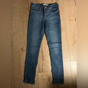 Levi’s 311 shaping skinny jeans, size 26, dark wash.